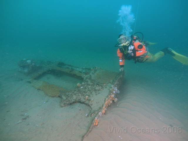 RS218047.JPG - Move to the East and there are more pieces spread across the seabed, this looks as though it may have been the rudder