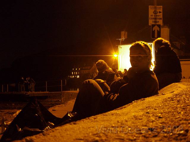 P8306422.JPG - An exhausted mob of  scallop polishers enjoyed a barbeque on the beach at Dale