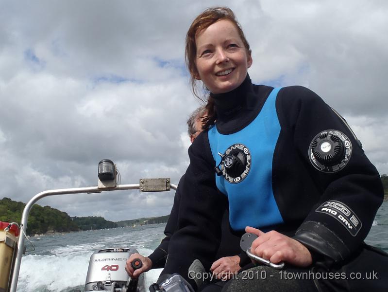 P5140001-1.JPG - Cap'n Gall - using her extra hands to steer the boat