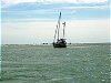 These sailors were high and dry til the next high tide, we squeaked out by the bar in less than a metre of water.