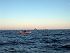 Our company for the dive Cambridge BSAC and one of those flashy new PADI dive boats in the background